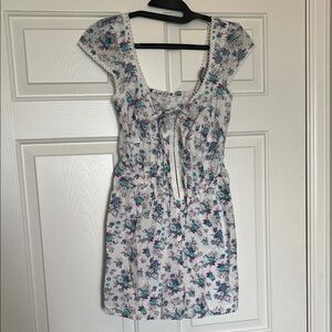 3/$20 NWOT Floral Romper with Bow Accent